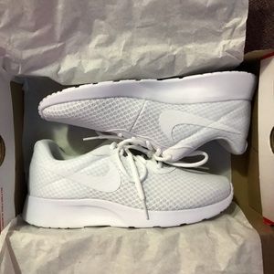 All white Nike Sneakers